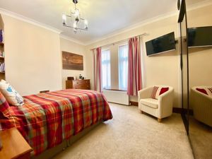 Bedroom One- click for photo gallery